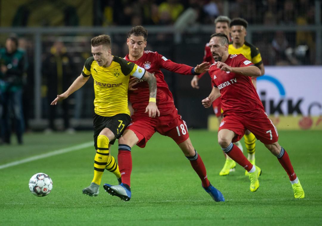 <p>Bei Dortmund kehrt Marco Reus (l.) aus der „Babypause“ zurück. Das Hinspiel gewann der BVB mit 3:2</p>