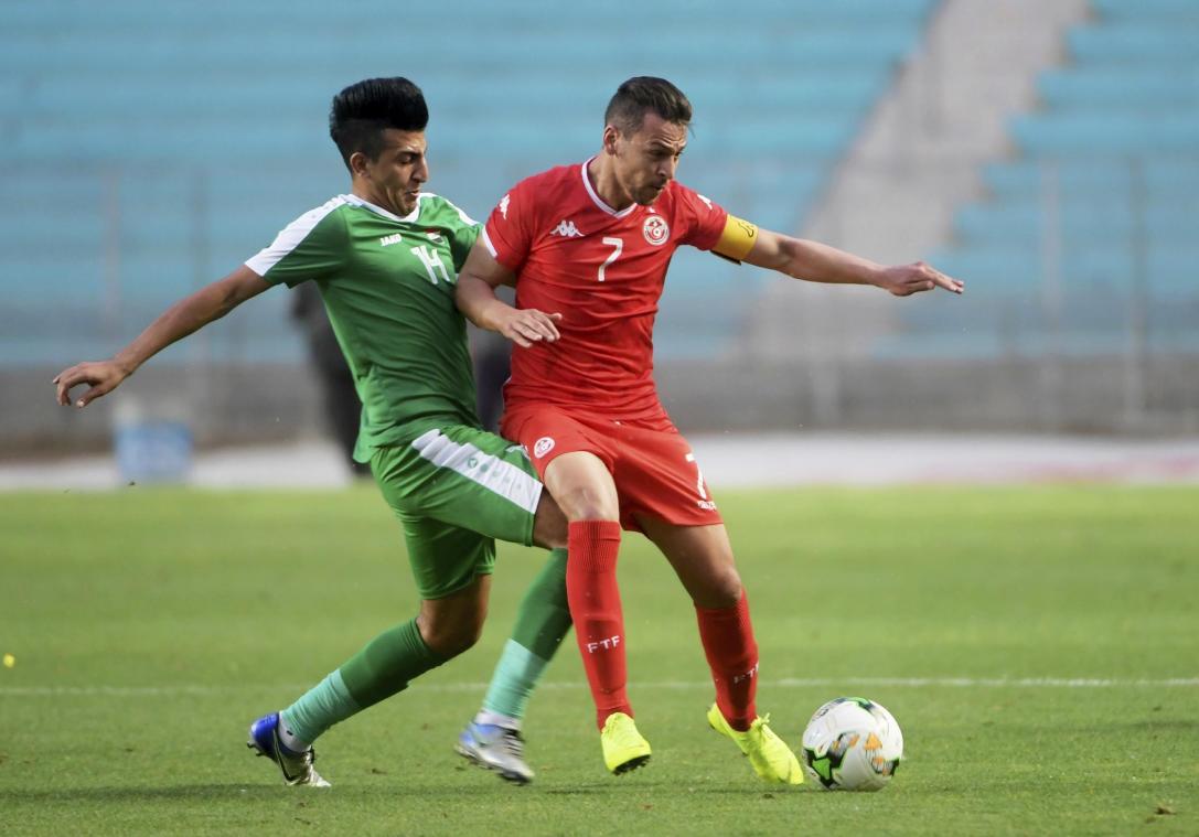 <p>Youssef Msakni (rechts) im Trikot der tunesischen Nationalmannschaft</p>