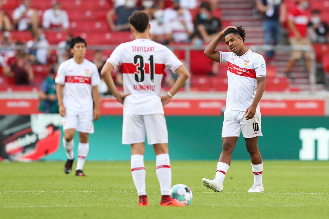 <p>Die Stuttgarter Wataru Endo (l-r), Mateo Klimowicz und Daniel Didavi reagieren im Spiel.</p>