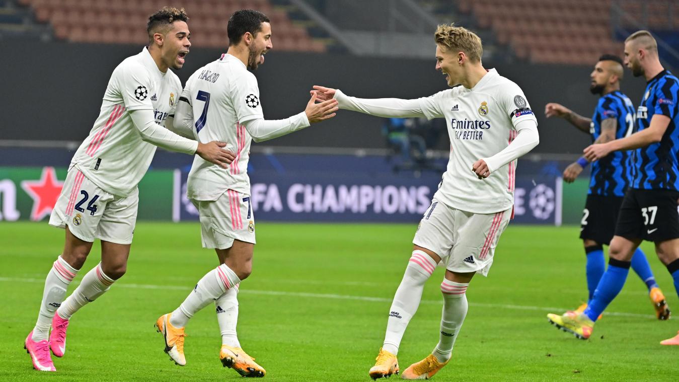<p>Brachte Real Madrid mit einem verwandelten Foulelfmeter in Front: Eden Hazard (Bildmitte) – hier mit seinem Teamkollegen Martin Ödegaard (rechts).</p>