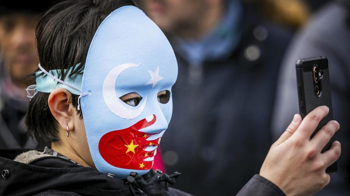 <p>Eine uigurische Demonstratin</p>