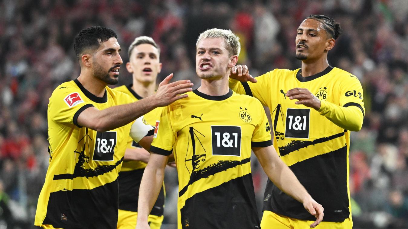 <p>Die Spieler von Dortmund mit Torschütze Dortmunds Julian Ryerson (M) jubeln über das zweite Tor.</p>