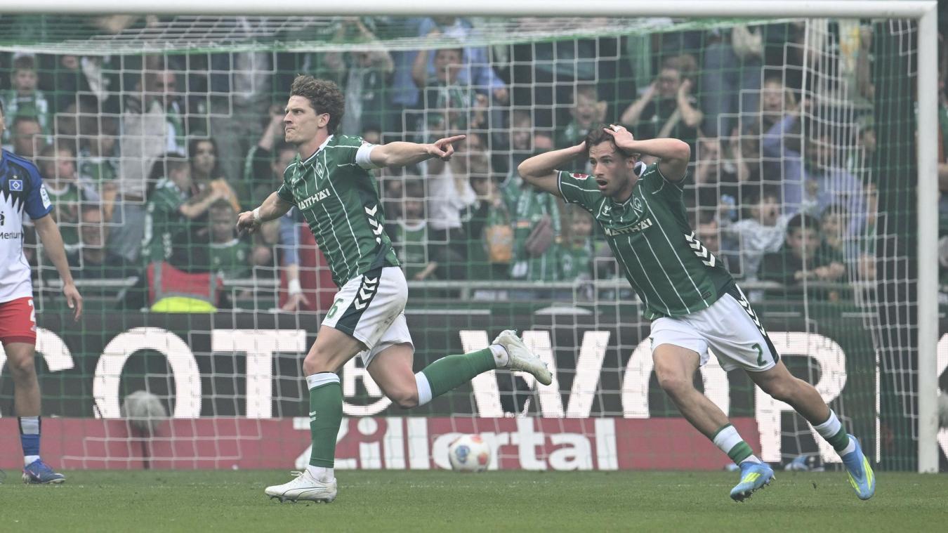 <p>Jens Stage (l,Werder Bremen) jubelt mit Olivier Deman (Werder Bremen) über sein Tor zum 2:1.</p>