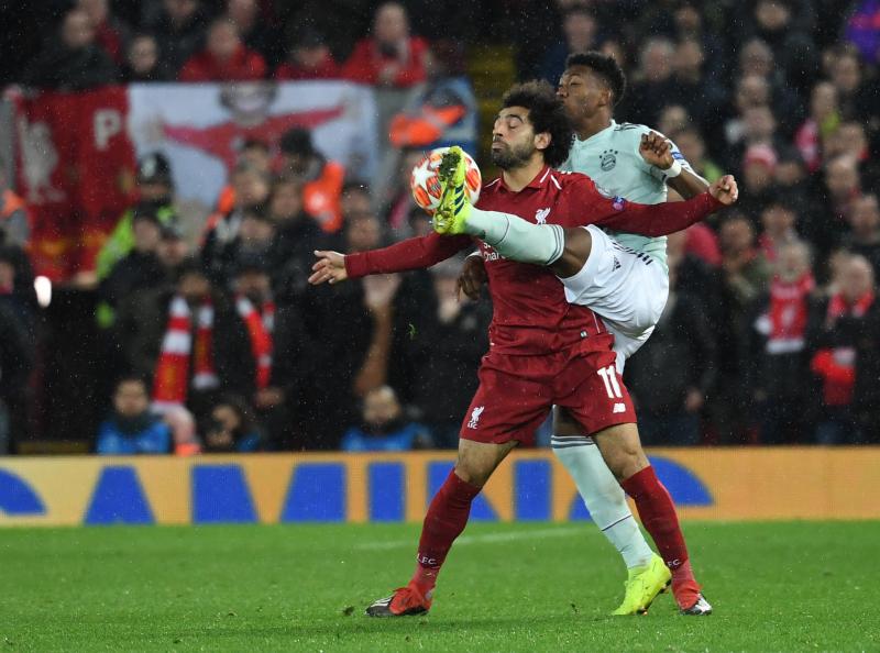 <p>Kämpften am Dienstagabend an der Anfield Road um den Ball: Liverpools Stürmerstar Mohamed Salah (rechts) und Bayerns Verteidiger David Alaba (links).</p>