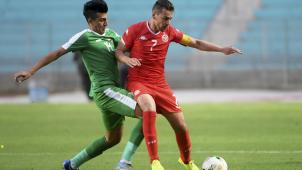 <p>Youssef Msakni (rechts) im Trikot der tunesischen Nationalmannschaft</p>
