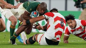 <p>Makazole Mapimpi (links) und seine südafrikanischen Gefährten schalteten Japan aus.</p>