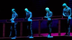 <p>Kraftwerk bei einem Auftritt im Jahr 2018.</p>
