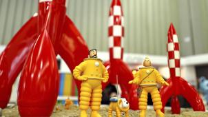 <p>Ikonisch: Die Comic-Figuren Kapitän Haddock (v.l.), Milou (Struppi) und Tintin (Tim) erorbern den Mond.</p>