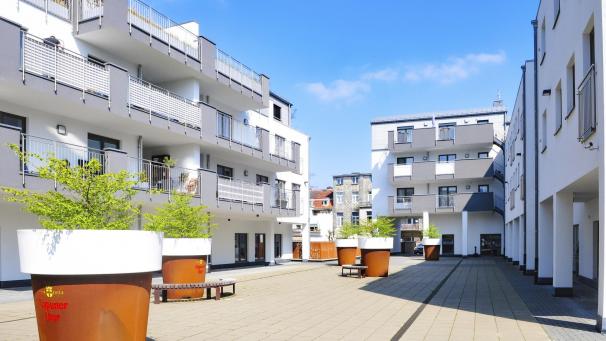 <p>So präsentiert sich der Innenhof des Brauereihofes zwischen Kloster- und Paveestraße nach der Fertigstellung des Mammutprojekts in der Eupener Innenstadt.</p>