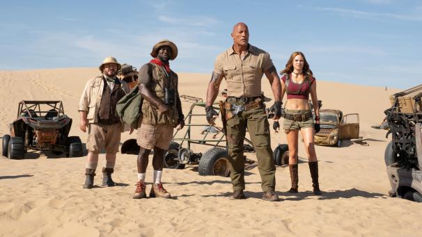 <p>Professor Shelly Oberon (Jack Black, l.-r.), Moose Finbar (Kevin Hart), Dr. Smolder Bravestone (Dwayne Johnson) und Ruby Roundhouse (Karen Gillan) in einer Szene des Films „Jumanji: The Next Level“ (undatierte Filmszene).</p>
