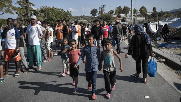 <p>Migranten, die aus dem Lager Moria geflohen sind.</p>