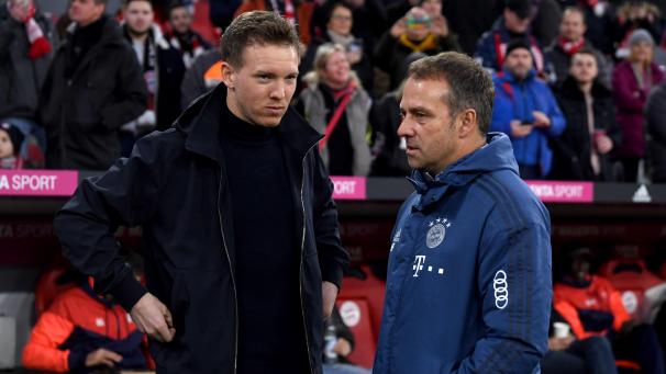 <p>Der spektakulärsten Trainer-Rochade im deutschen Fußball um Hansi Flick (rechts) und Julian Nagelsmann (links) steht noch eine Rekordablöse im Weg.</p>