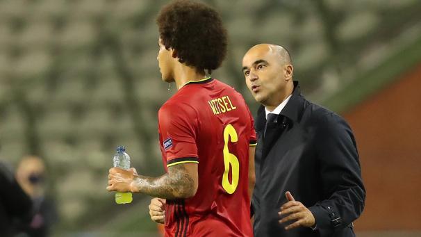 <p>Darf mitfahren und hat das Vertrauen des Nationaltrainers Roberto Martinez (r.) : Axel Witsel.</p>
