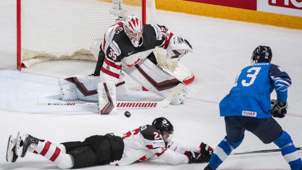 <p>Die Kanadier (in den weißen Trikots) setzten sich in der Verlängerung gegen Finnland durch.</p>
