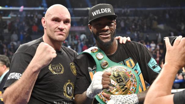 <p>Müssen sich gedulden: Deontay Wilder (rechts) und Tyson Fury (links).</p>