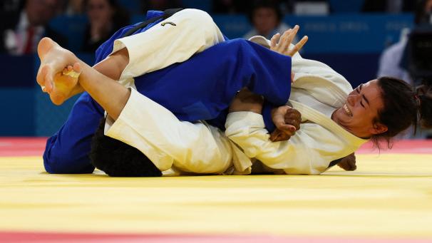 <p>Gabriella Willems (in weiß)</p>