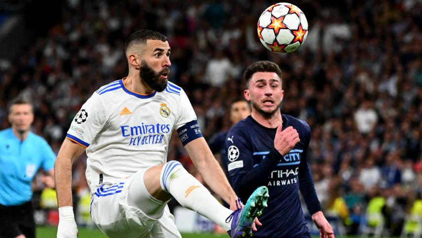 <p>Topklubs wie Real Madrid und Manchester City (hier Benzema im Duell mit Laporte) dürfen sich ab der Saison 2024/25 über mehr Einnahmen freuen.</p>